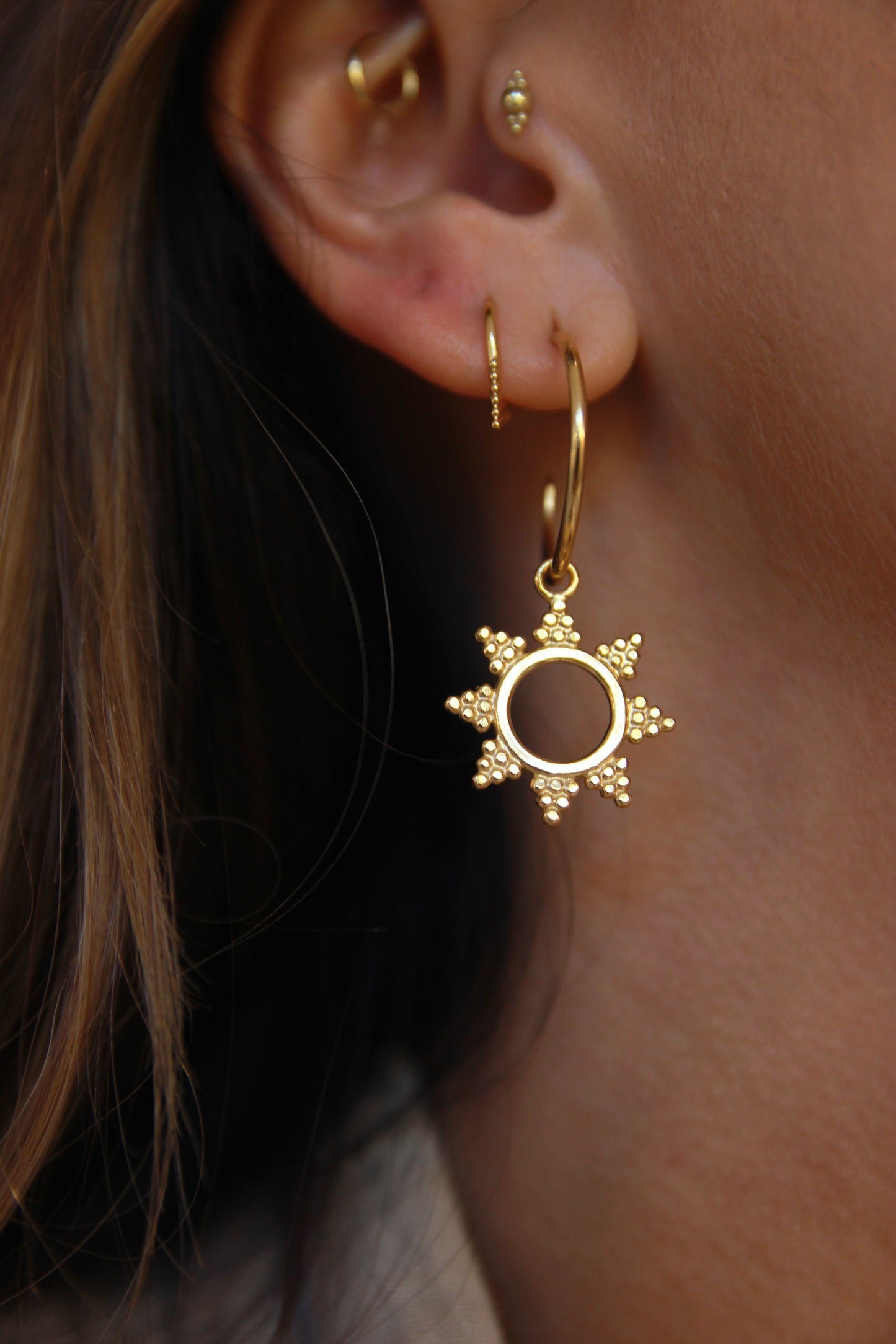 Gold sun hoop earrings