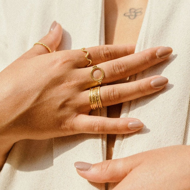 golden ring, handmade jewellery worn on model. unique design gold ring. Circle Ring