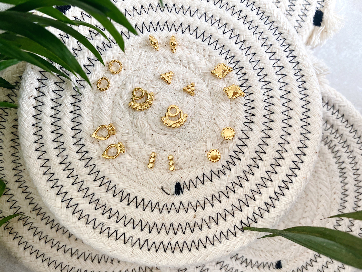 Tiny gold stud earrings