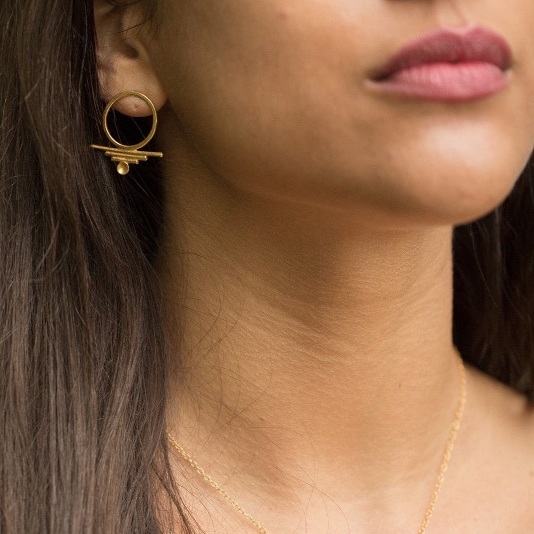 tulum stud earrings on model